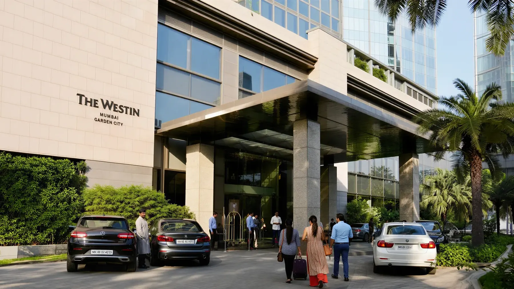 Hotel porte-cochère with arriving guests